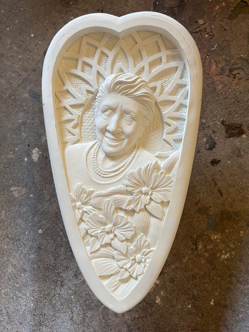 Nani, carved half-board portrait