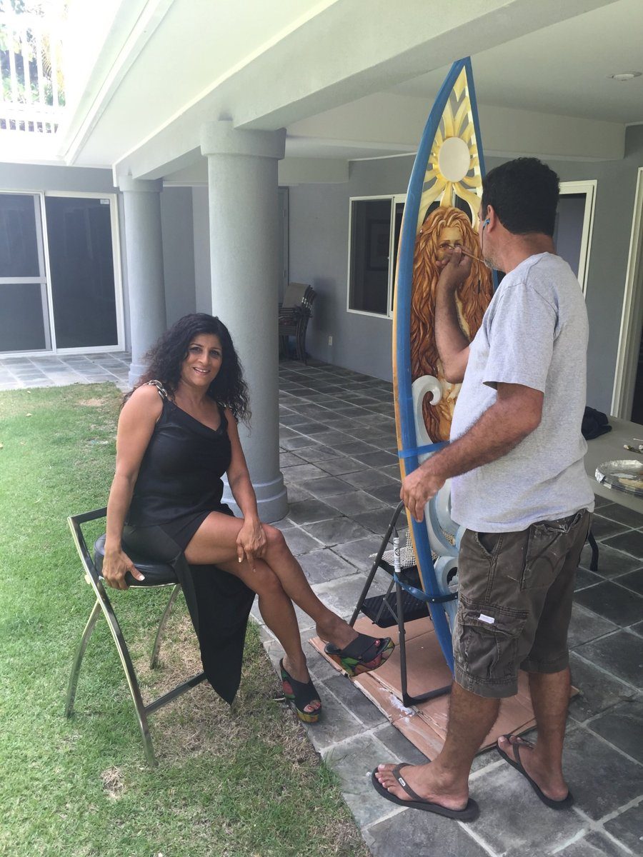 Ruben painting Serene, with Sonya beside him.