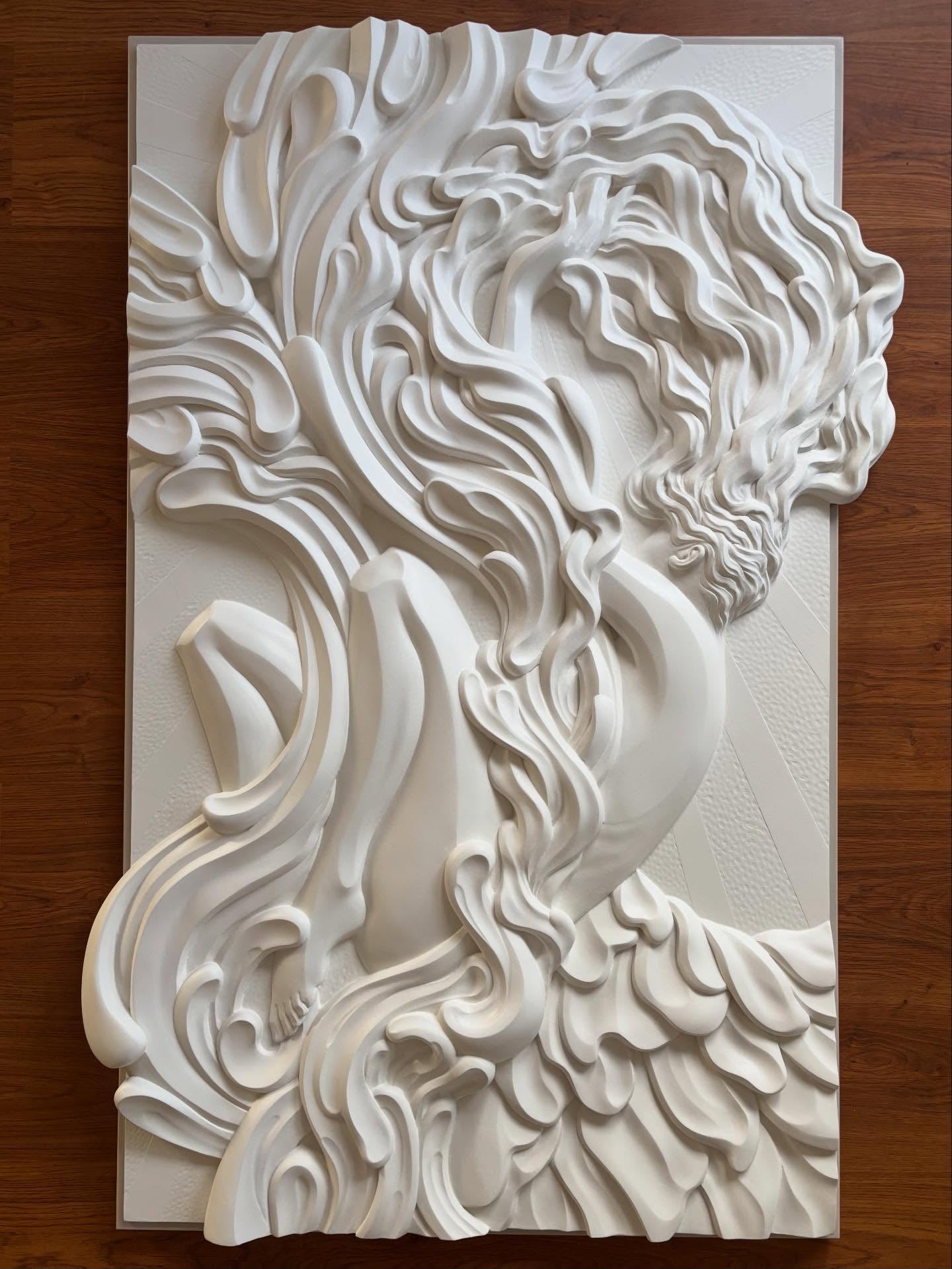 Hawaiian artist Ruben Aira Jr's "Awakening" a Hand carved art piece. Surfing, carving, painting, sculpting, Ruben does it all. Created in Hawaii.